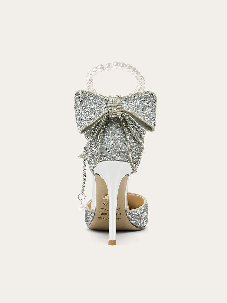Elegant women's French pointy high heels by Mohammand Collection with sequin bow, shallow mouth, pearl line, and fine heel detail.