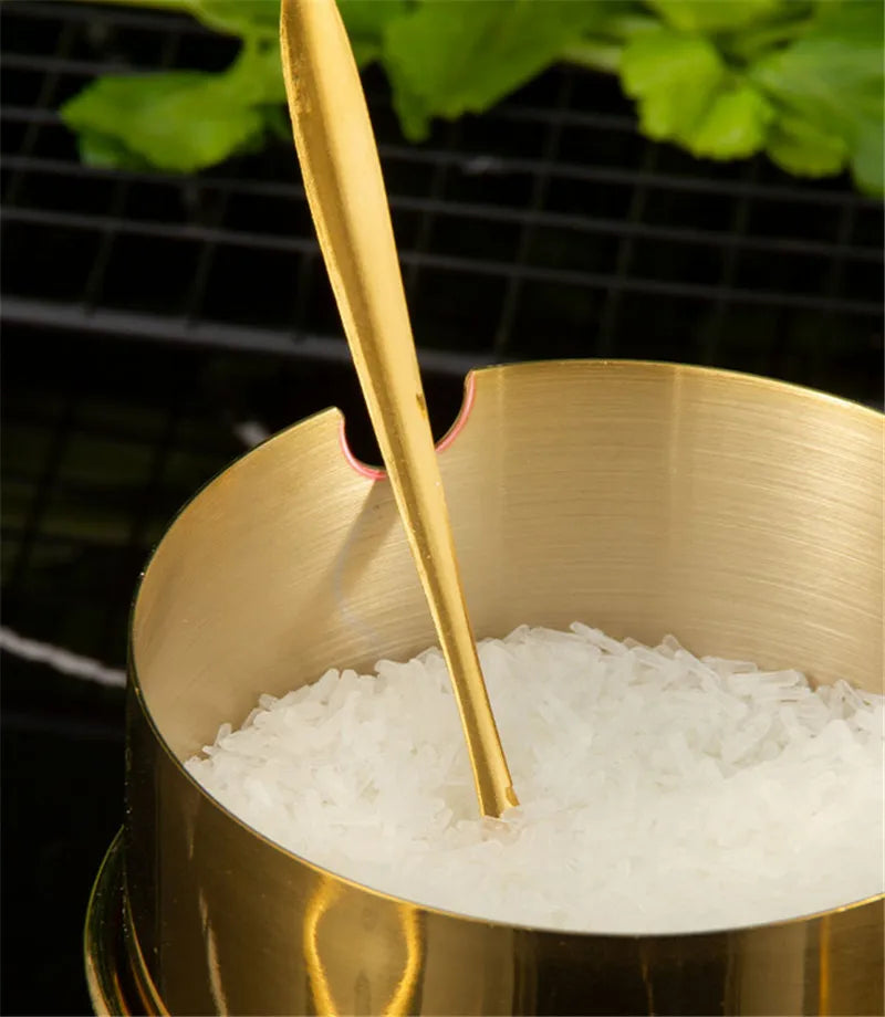 Gold MC THE BLACK DIAMOND seasoning box with glass cap, spoon, and spice jar for salt, soy sauce, and flavoring storage in the kitchen.