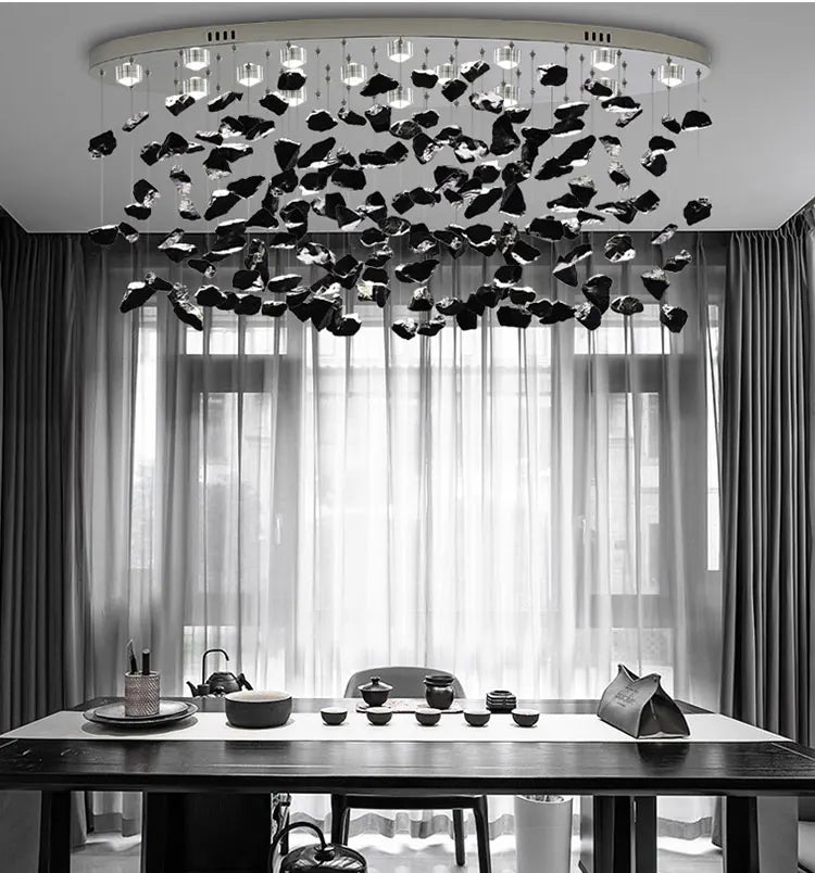 Black Art Luxury Stone Crystal Chandelier by MC THE BLACK DIAMOND with LED crystals, hanging in a modern staircase or hallway.