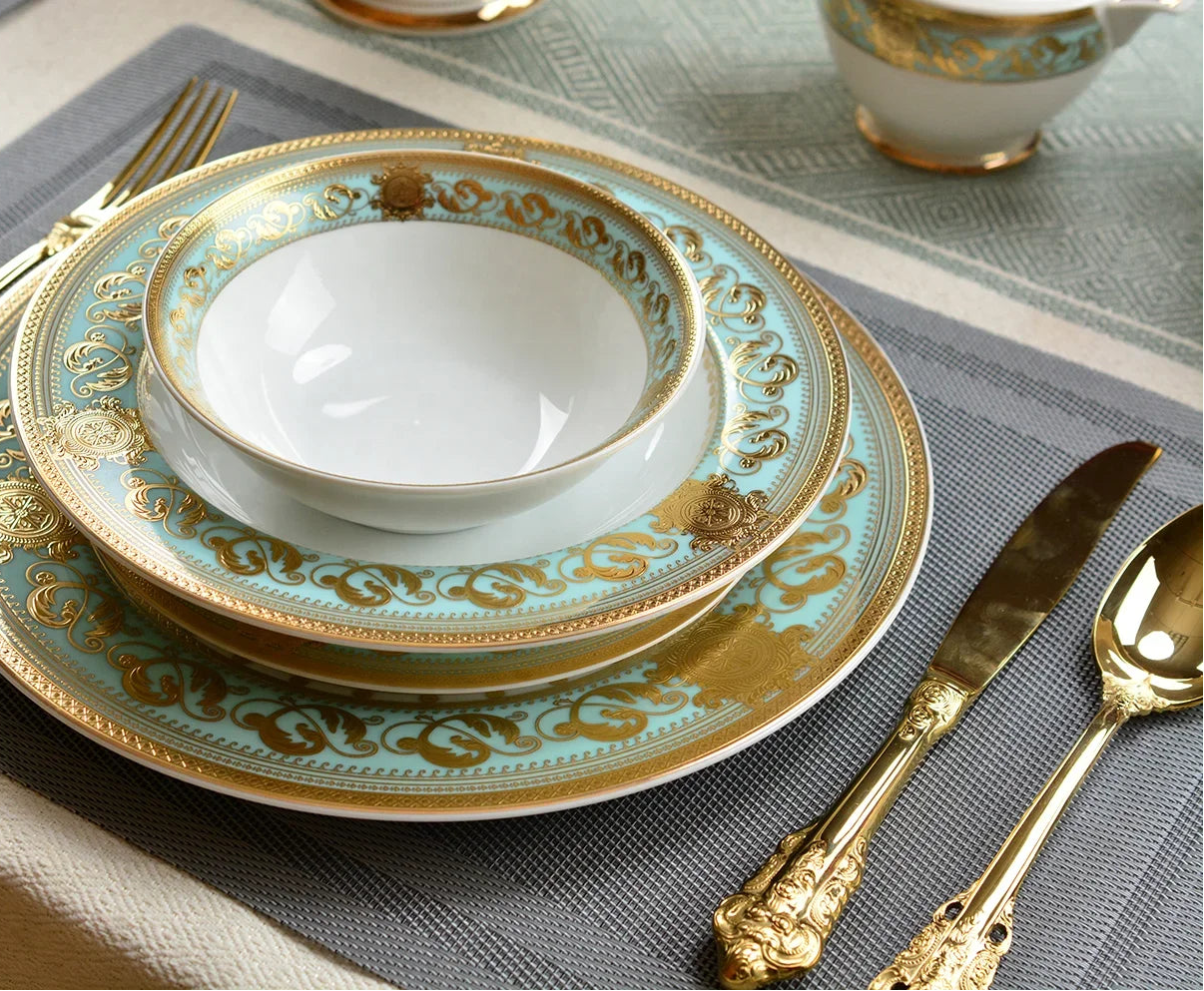 Elegant gold embossed porcelain dinnerware set by MC THE BLACK DIAMOND featuring luxury bone china with intricate embossed patterns.