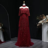 Beaded grey Arabic evening dress by MC THE BLACK DIAMOND featuring intricate beadwork and elegant design.