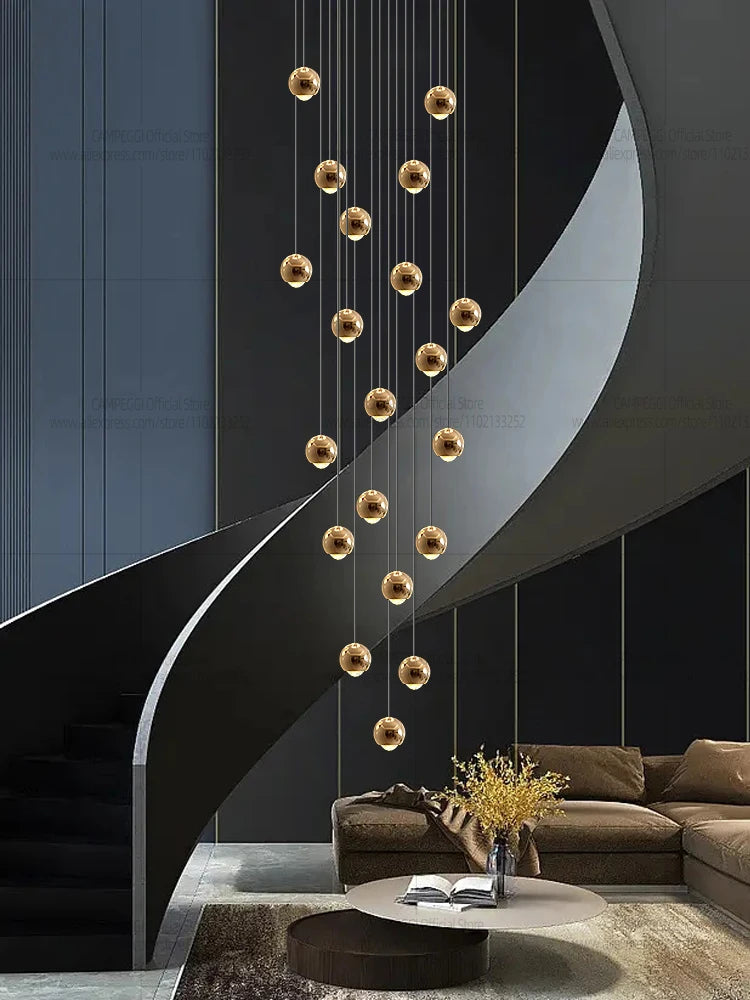 MC THE BLACK DIAMOND modern LED staircase pendant light hanging in a living room setting with sleek design and warm illumination.