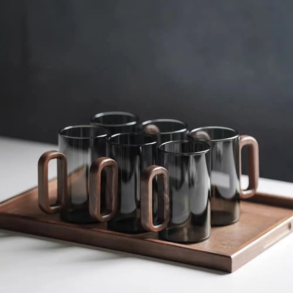 Glass mug with wooden handle from 𝕄𝕔 𝕋𝕙𝕖 𝔹𝕝𝕒𝕔𝕜 𝔻𝕚𝕒𝕞𝕠𝕟�