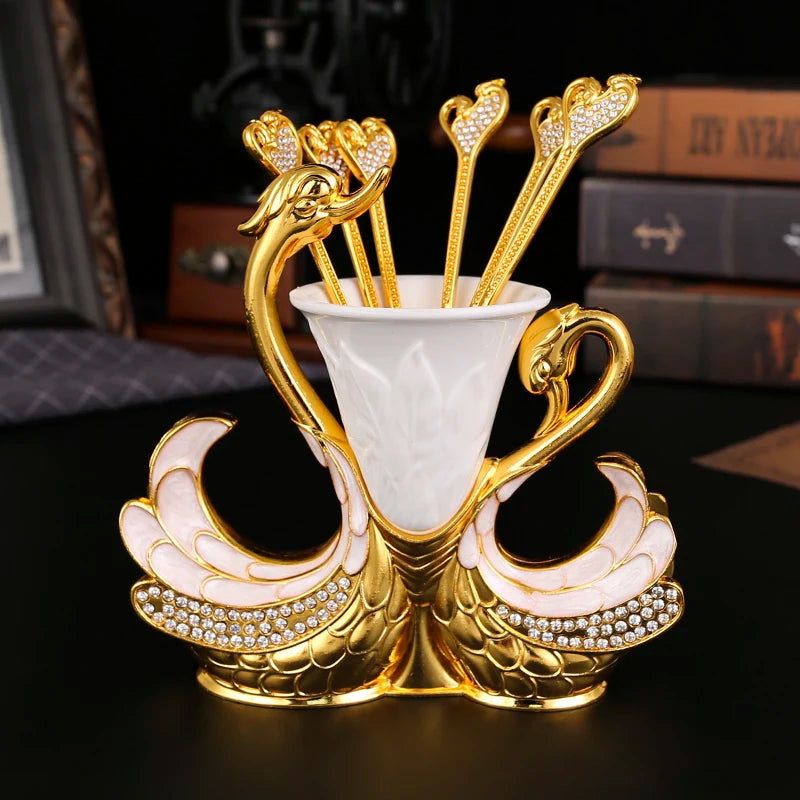 Swan-shaped fruit fork and spoon set from 𝕄𝕔 𝕋𝕙𝕖 𝔹𝕝𝕒𝕔𝕜 𝔻𝕚𝕒𝕞𝕠�
