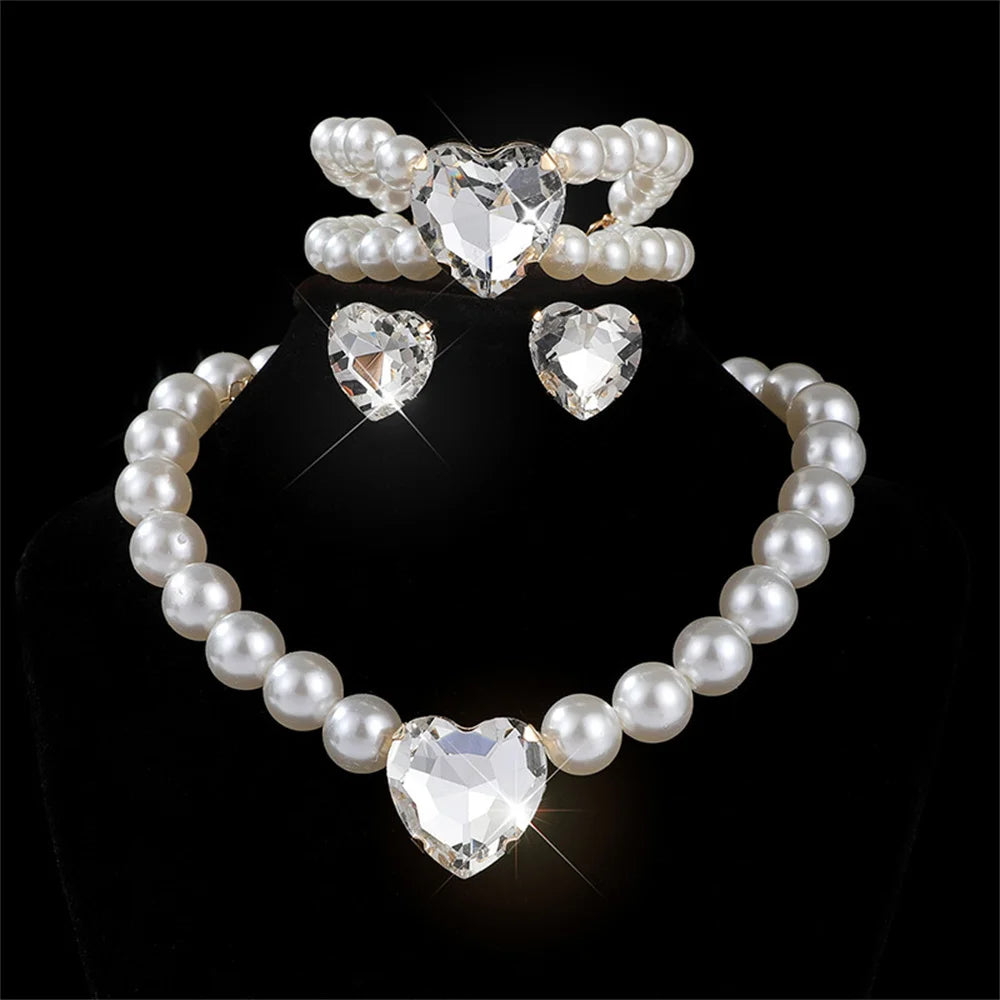 Elegant bridal jewelry set with versatile earrings and a matching necklace by MC THE BLACK DIAMOND, suitable for special occasions.