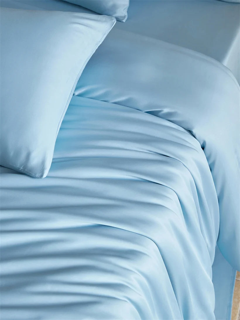 Luxury MC Collection 100% Mulberry Silk bedding set in elegant home decor, featuring smooth silk sheets and pillowcases.