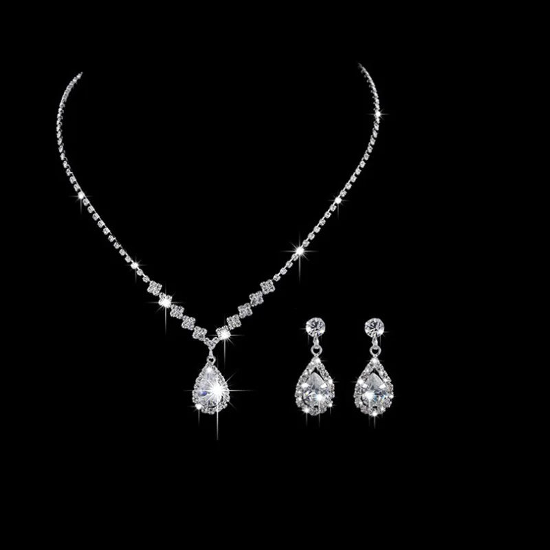 Vintage crystal waterdrop pendant necklace and matching earrings in silver from MC THE BLACK DIAMOND wedding jewelry set