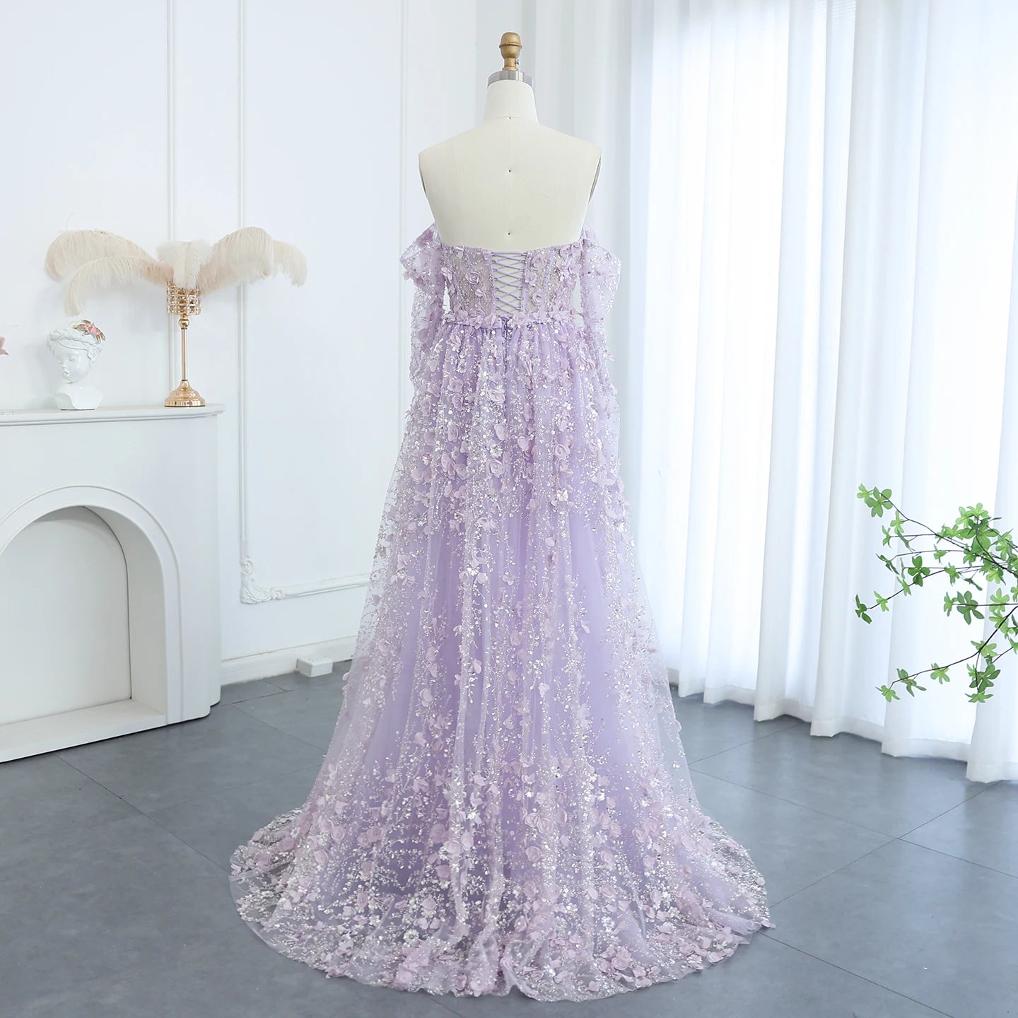 Elegant MC THE BLACK DIAMOND MC Elegant 3D Flowers Dubai evening dress with intricate floral details and flowing fabric.