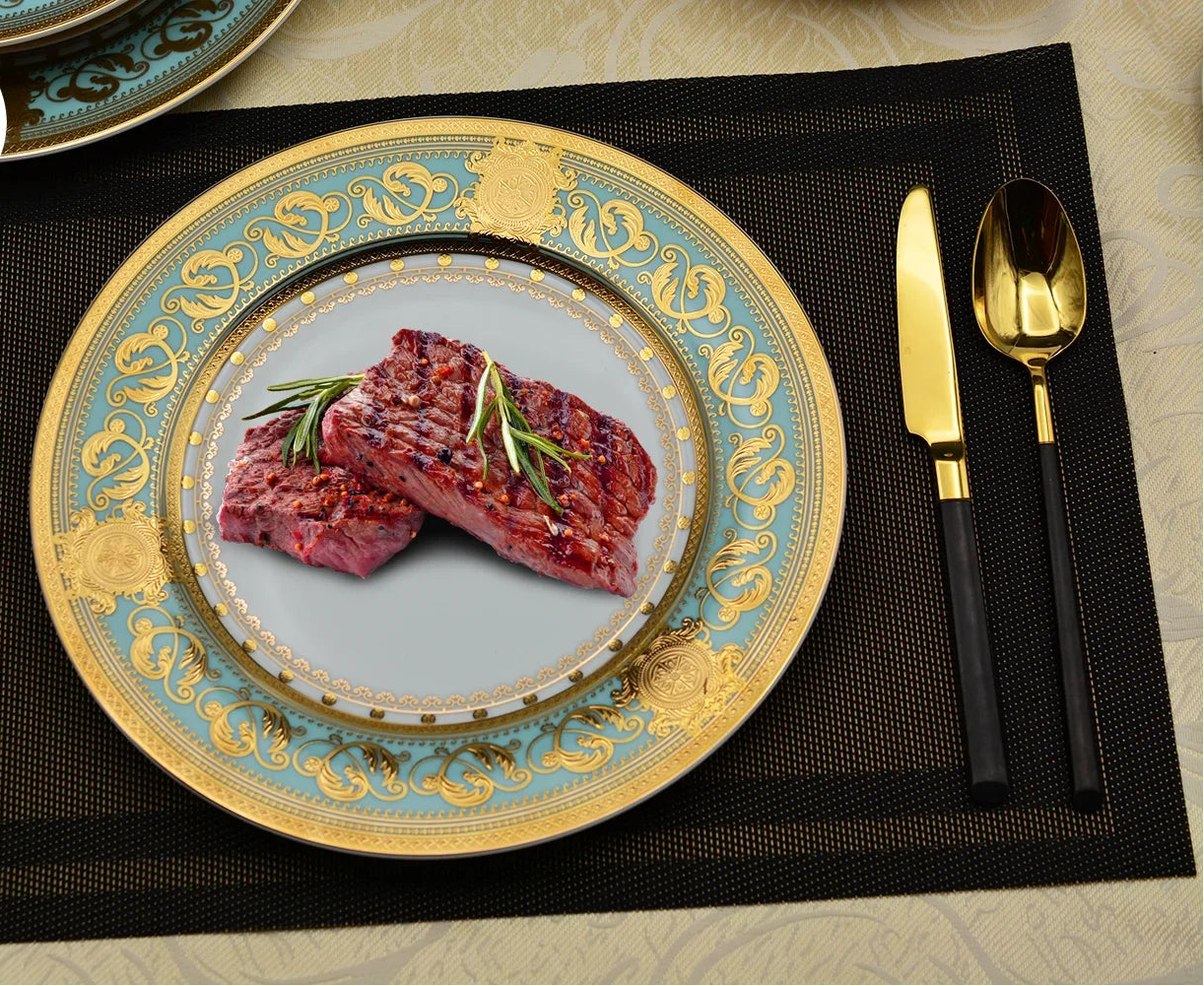 Elegant gold embossed porcelain dinnerware set by MC THE BLACK DIAMOND, featuring luxurious bone china with intricate embossed detailing.