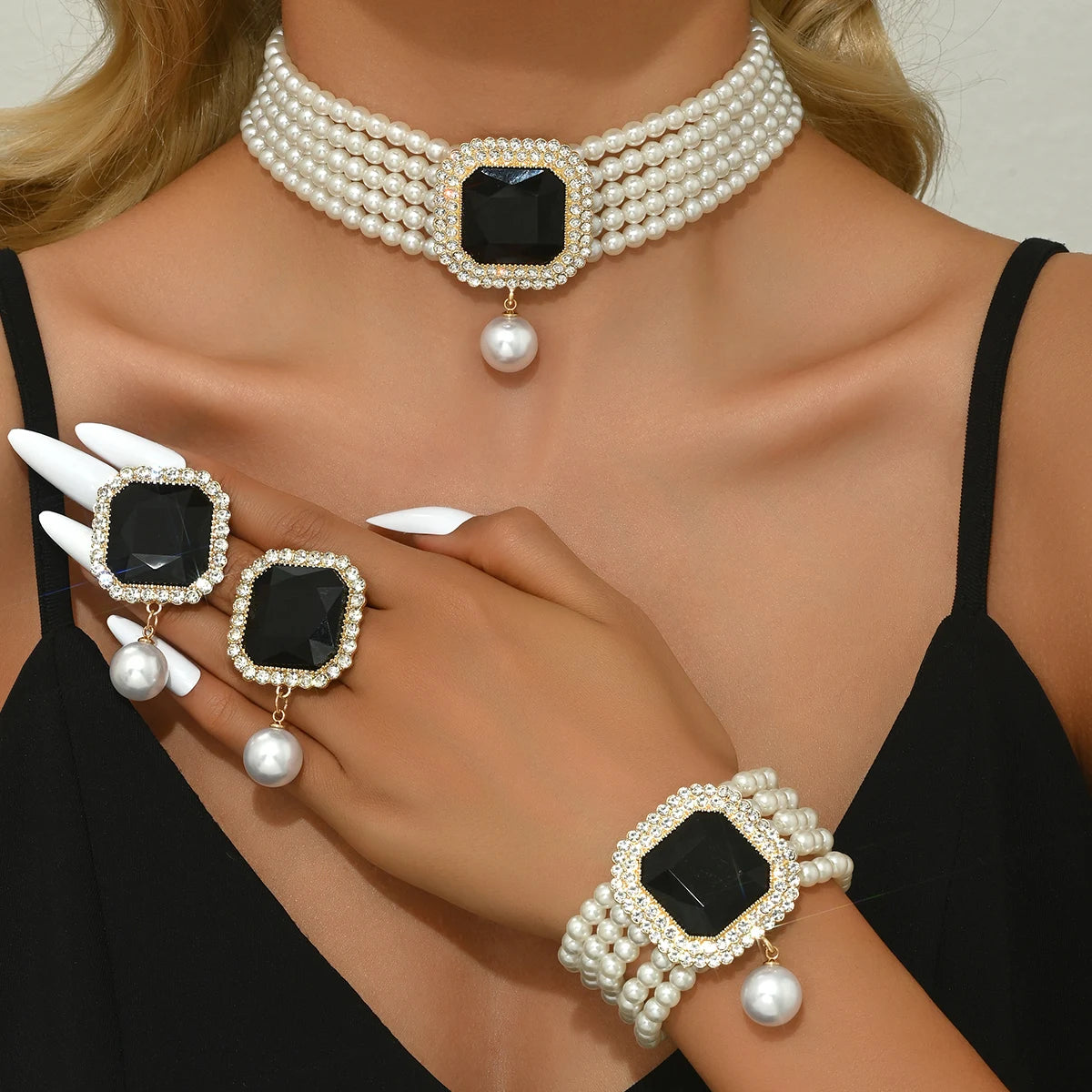 MC THE BLACK DIAMOND women's fashion jewelry set featuring pearl and rhinestone necklace, earrings, and bracelet for parties and festivals.