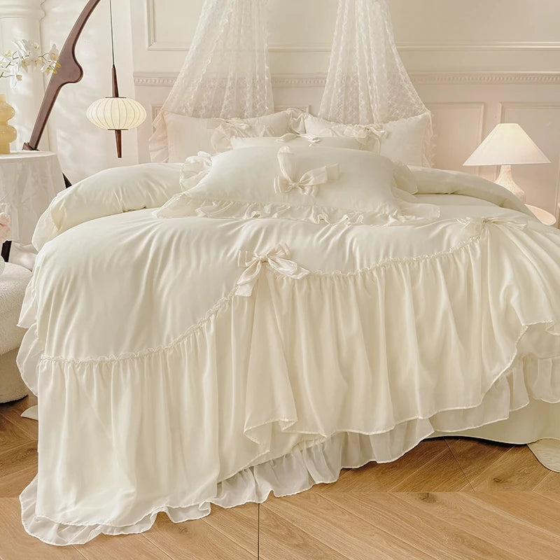 Three-piece white bedding set with ruffled duvet cover and bedsheets from 𝕄𝕔 𝕋𝕙𝕖 𝔹𝕝𝕒𝕔𝕜 𝔻𝕚𝕒𝕞