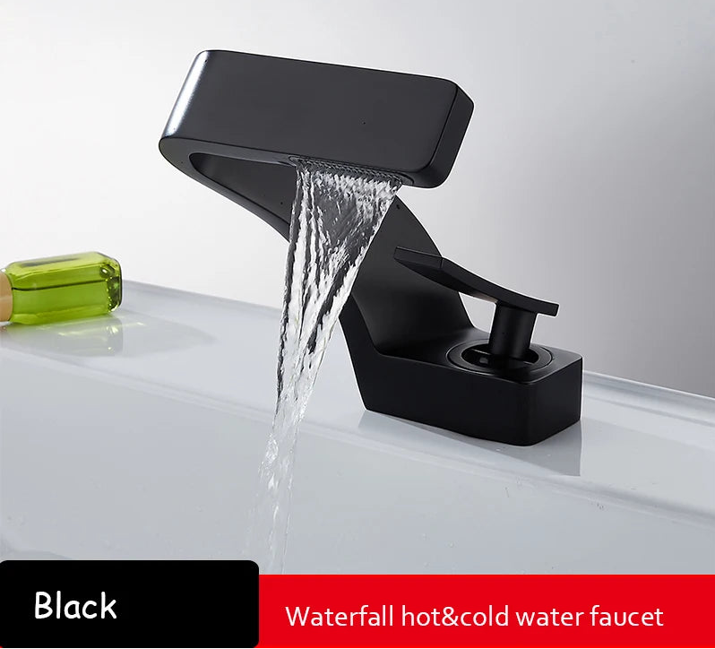 Black and gold brass basin faucet from 𝕄𝕔 𝕋𝕙𝕖 𝔹𝕝𝕒𝕔𝕜 𝔻𝕚𝕒𝕞𝕠𝕟�