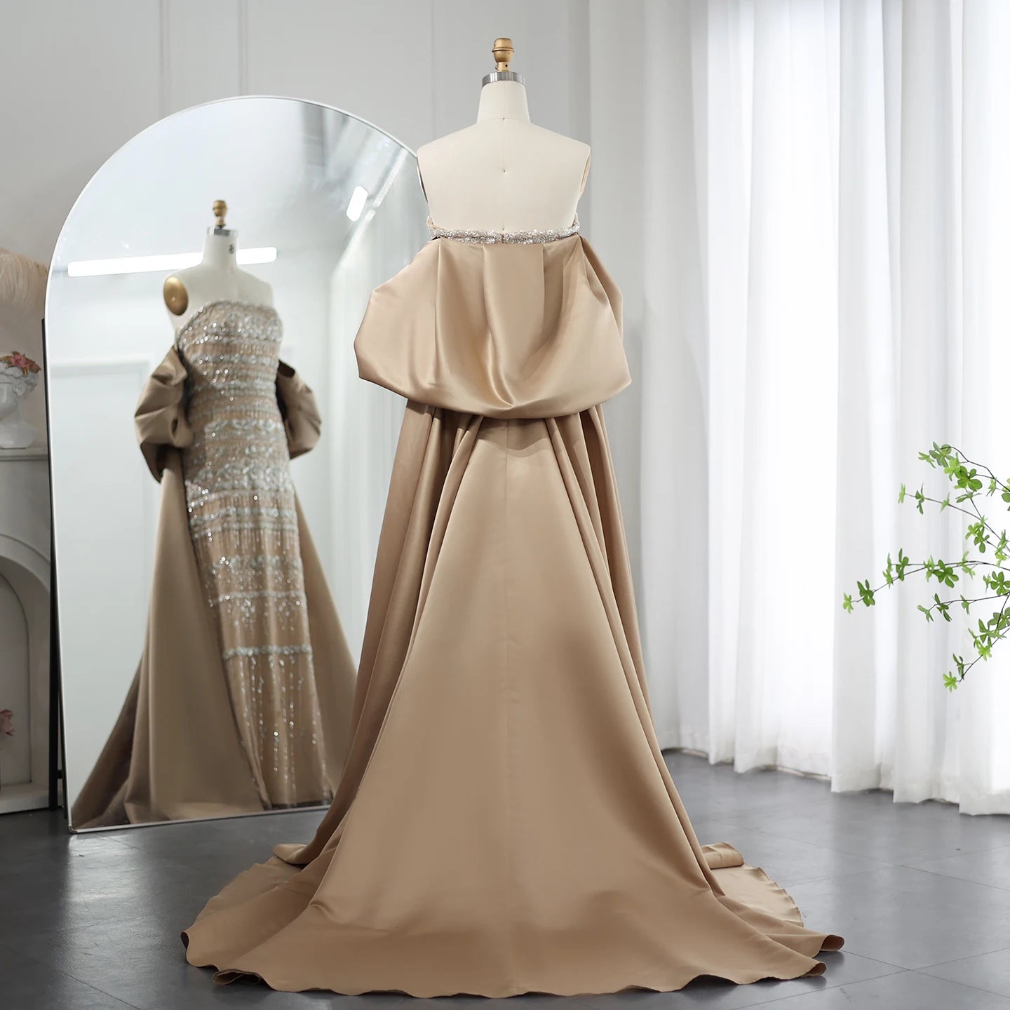 Elegant MC THE BLACK DIAMOND MC Luxury Dubai evening dress in sage green with a cape, perfect for weddings and parties.