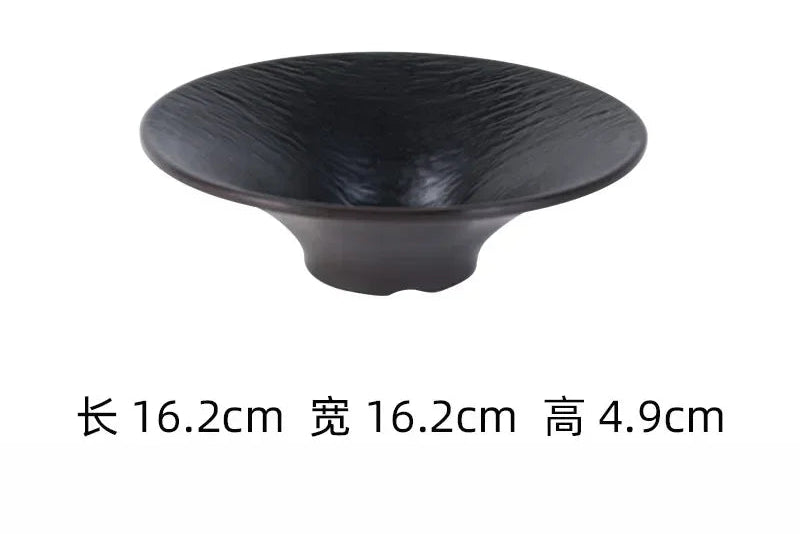 Black frosted melamine dinner plate from 𝕄𝕔 𝕋𝕙𝕖 𝔹𝕝𝕒𝕔𝕜 𝔻𝕚𝕒𝕞𝕠𝕟