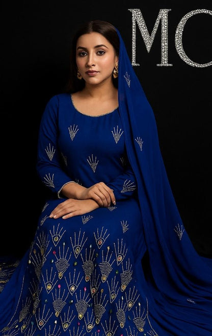 Luxury blue rhinestone chiffon fabric by Mohammad Collection, 60" wide, perfect for wedding drapes or dressmaking projects.