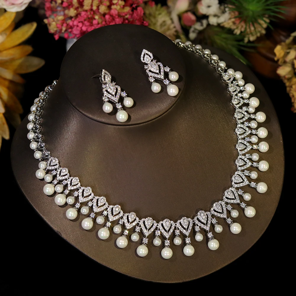 Elegant pearl necklace for women jewelry featuring a string of lustrous white pearls on a delicate chain.