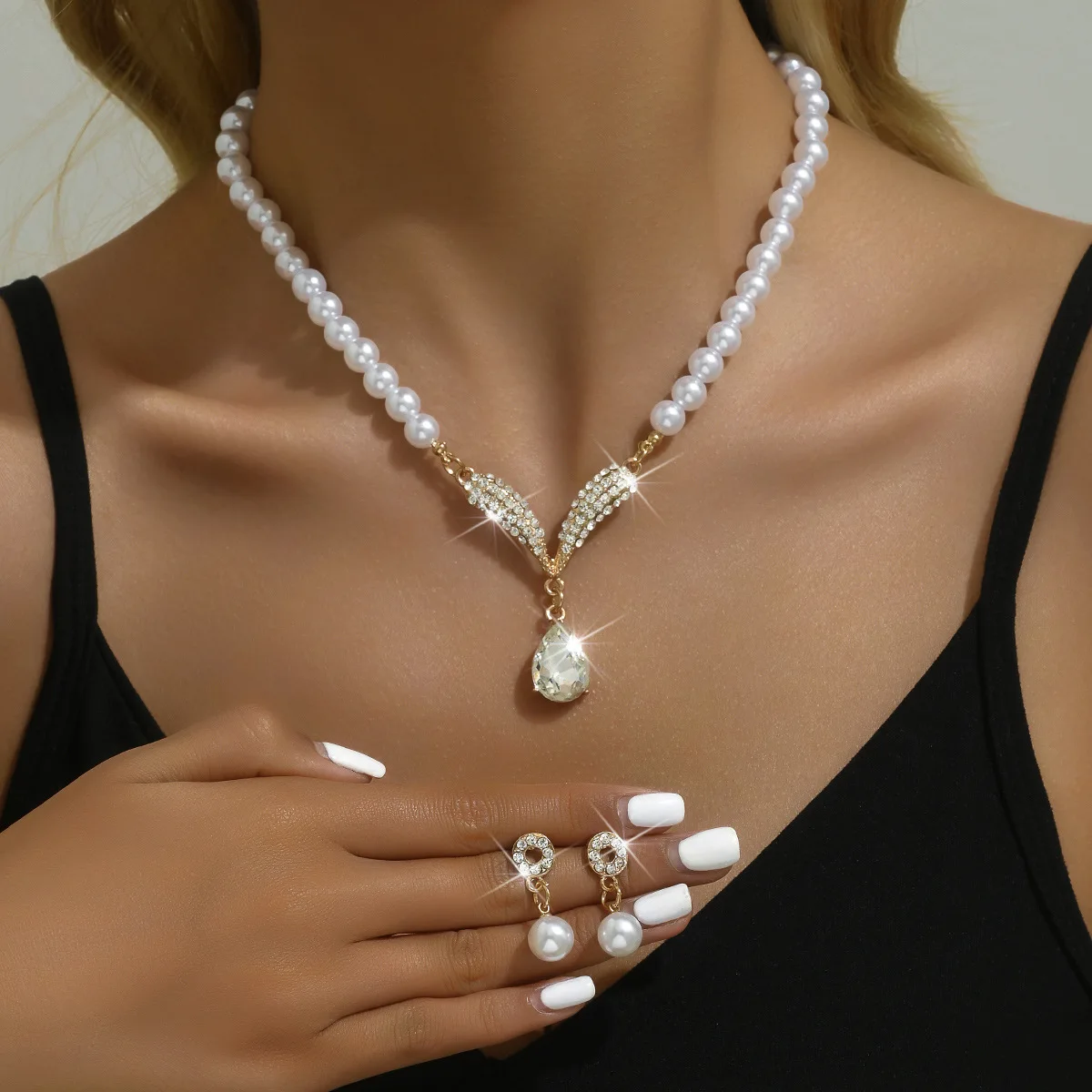 Mohammad Collection women's 3-piece pearl jewelry set with necklace and earrings, elegant gold-tone design for versatile styling.