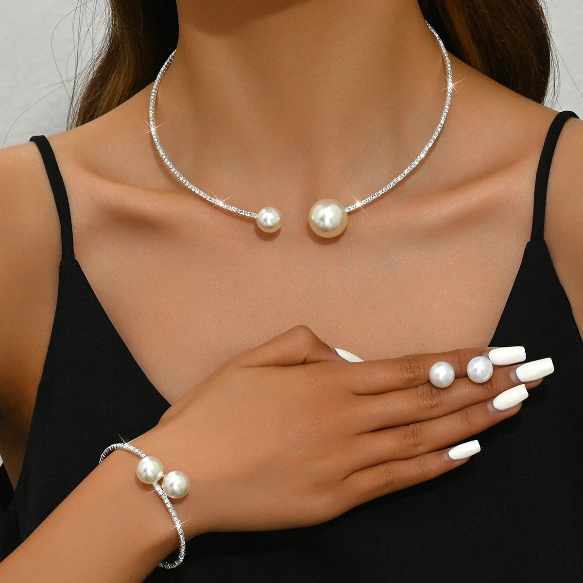 Mohammad Collection full crystal jewelry set with minimalist pearl necklace, bracelet, and earrings featuring elegant crystal accents.